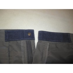 Aide technique pour fermer un pantalon ou une jupe d'une seule main