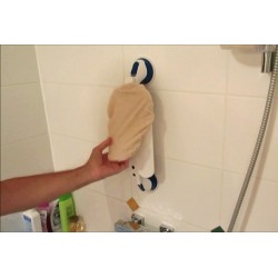 Gant amovible fixé à la paroi de douche par ventouses pour se laver d'une main